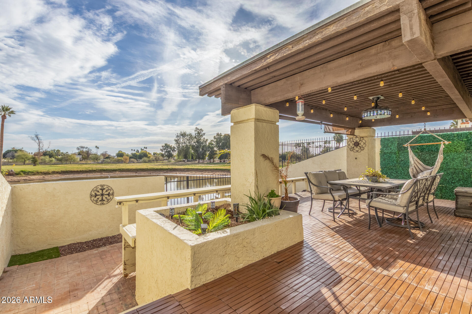 2529 North Miller Road Scottsdale, AZ 85257 - Photo 26 of 65 a view of a patio with couches table and chairs