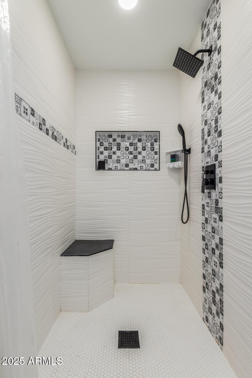 2529 North Miller Road Scottsdale, AZ 85257 - Photo 36 of 65 a bathroom with a shower