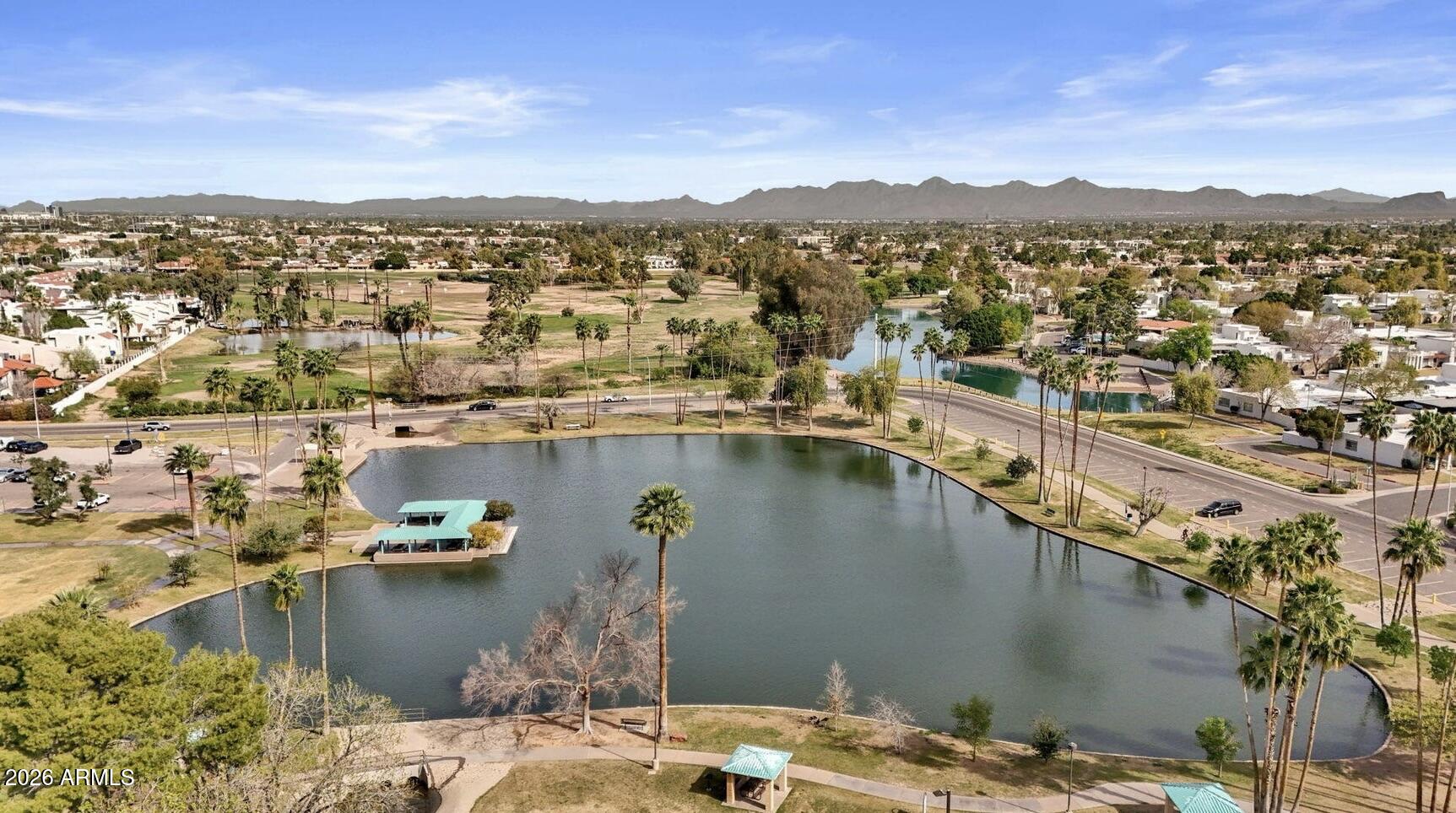2529 North Miller Road Scottsdale, AZ 85257 - Photo 63 of 65 a view of a lake with a mountain
