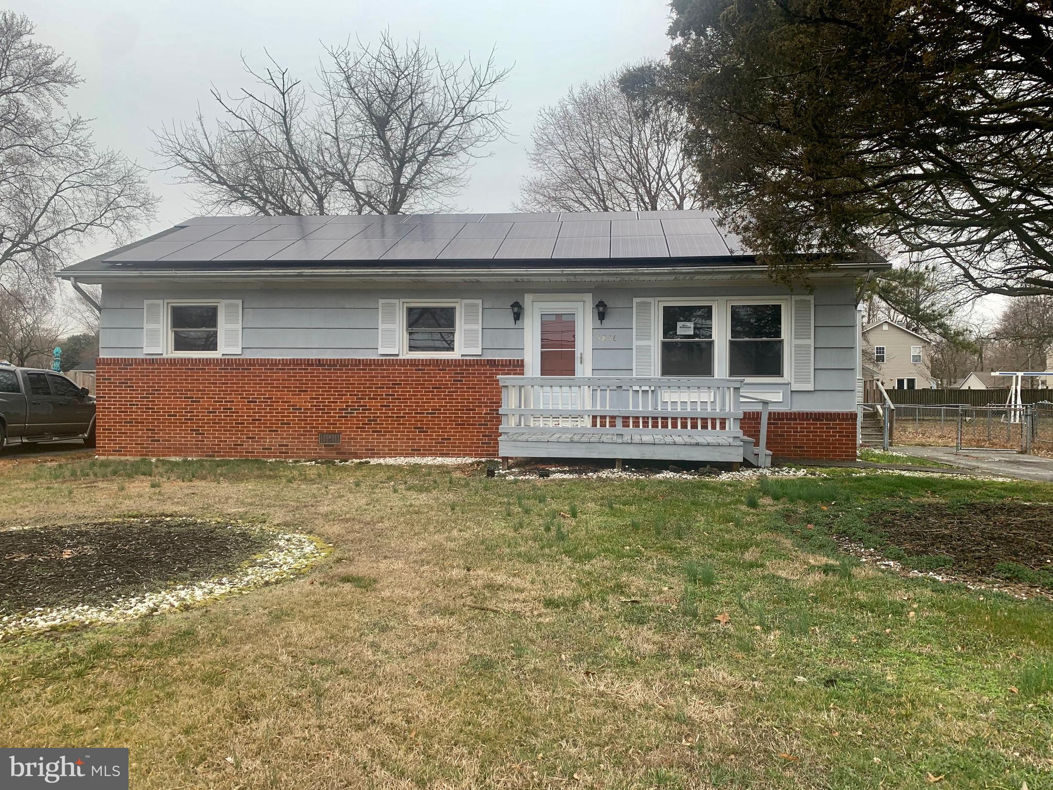 5866 Deale Churchton Road Deale, MD 20751 - Photo 1 of 26 a house that has tree in front of it