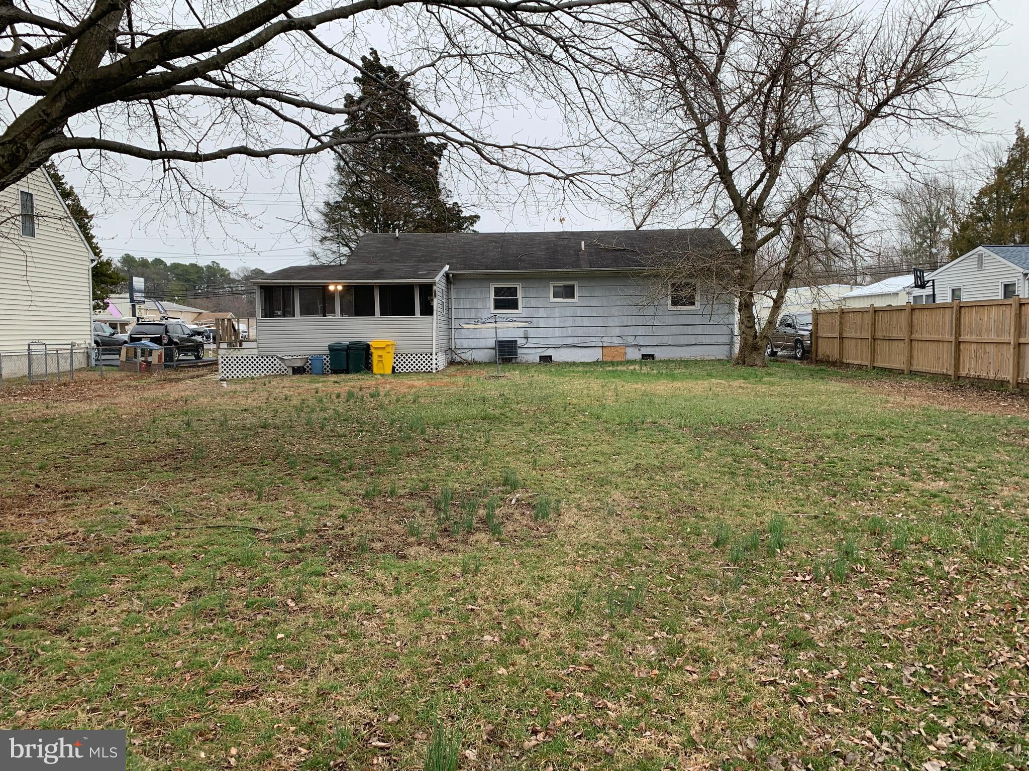 5866 Deale Churchton Road Deale, MD 20751 - Photo 2 of 26 a view of a house with a back yard
