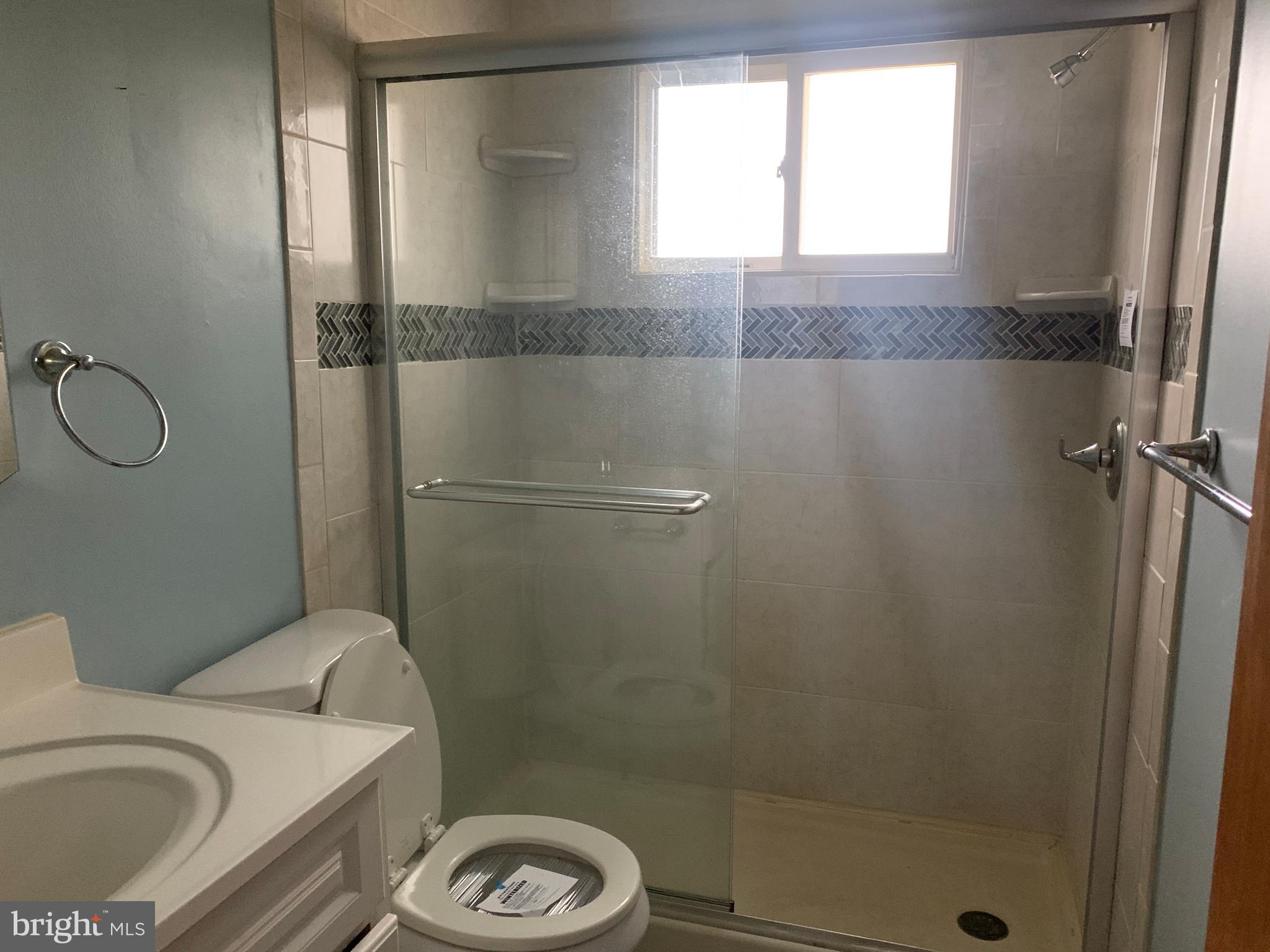 5866 Deale Churchton Road Deale, MD 20751 - Photo 17 of 26 a bathroom with a sink and a toilet