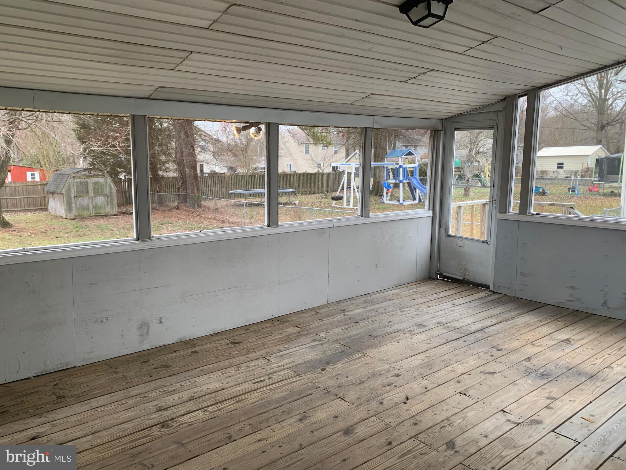 5866 Deale Churchton Road Deale, MD 20751 - Photo 19 of 26 a view of an empty room with a window