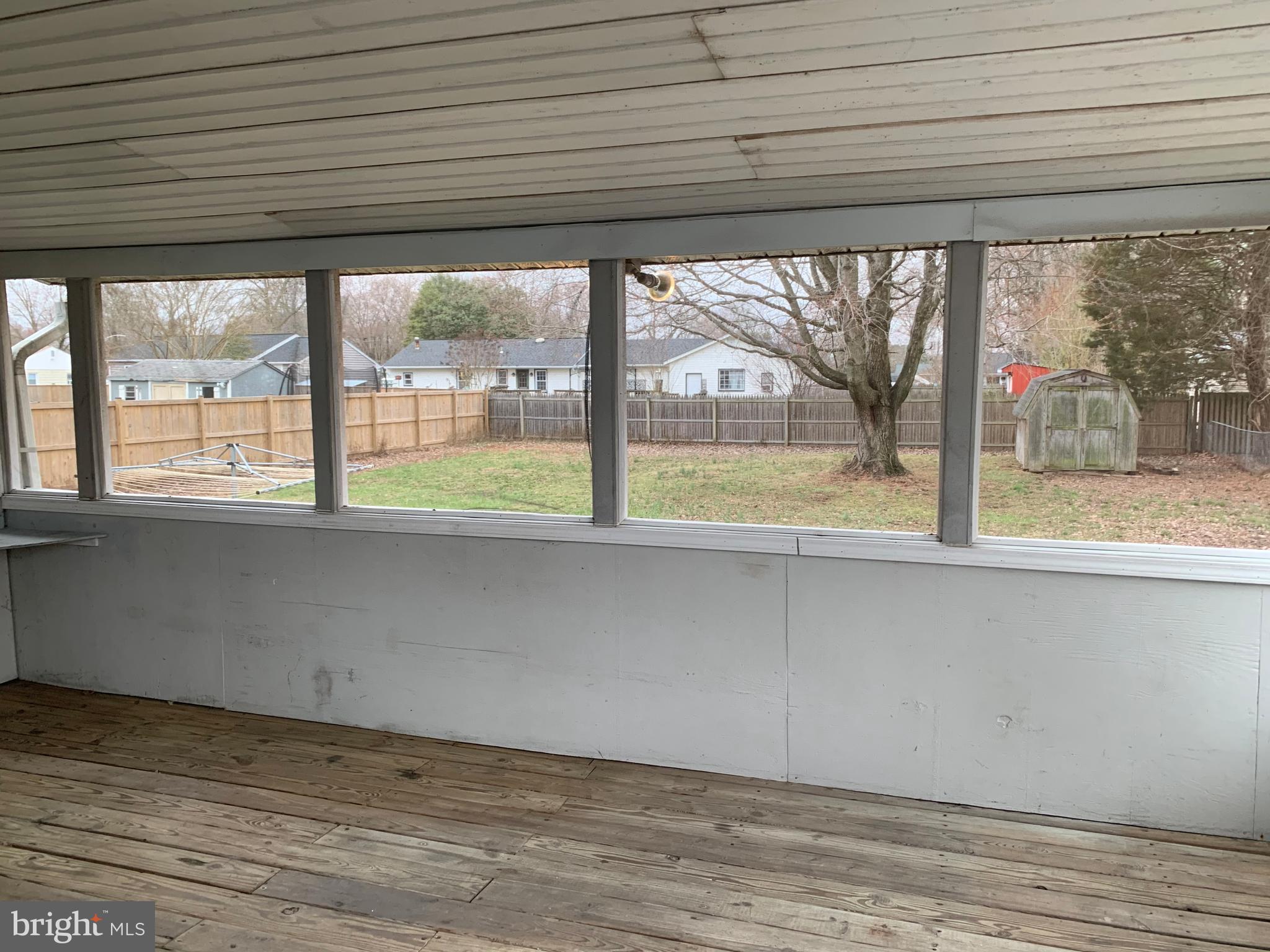 5866 Deale Churchton Road Deale, MD 20751 - Photo 20 of 26 a view of empty room with large windows