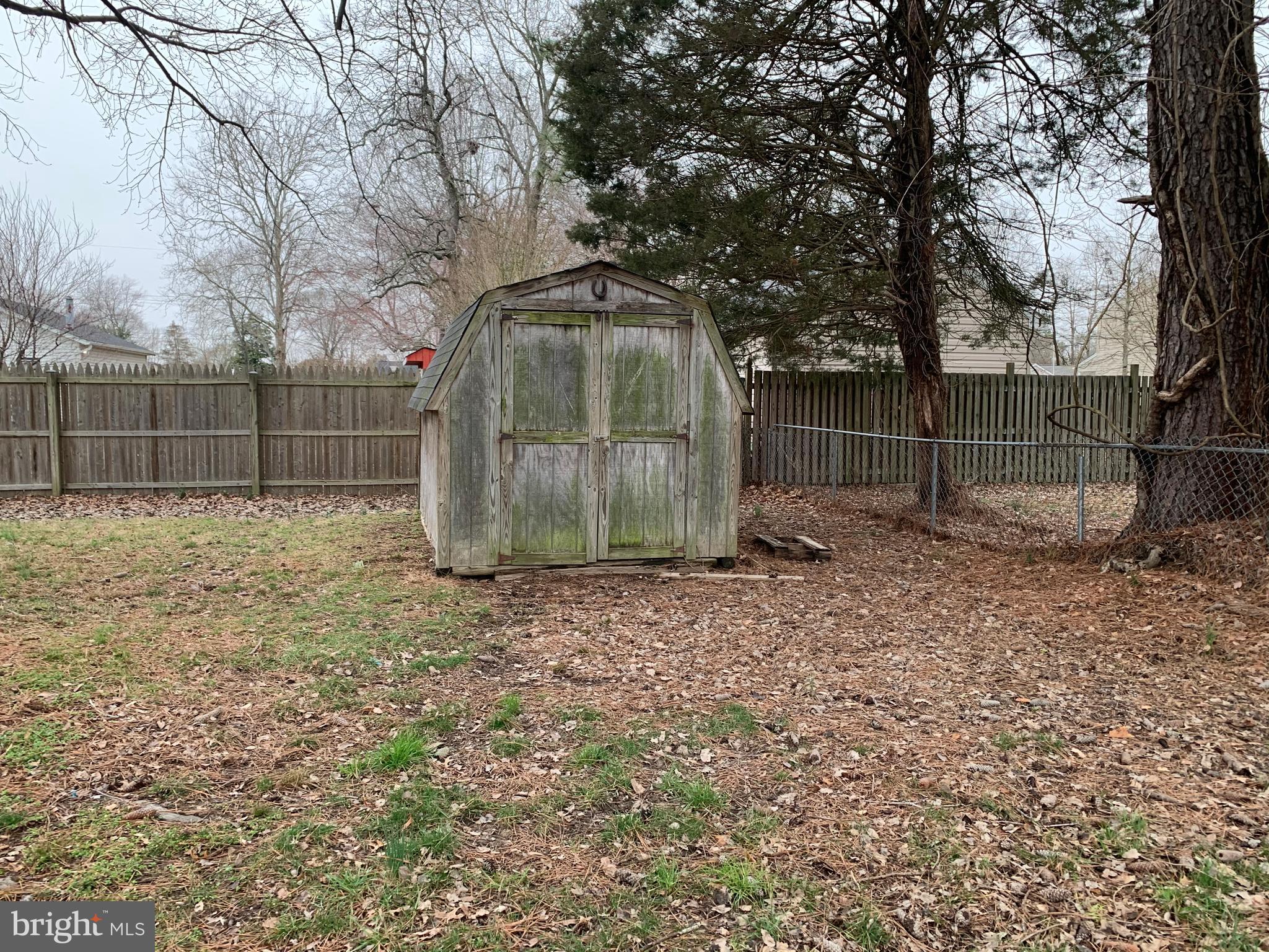 5866 Deale Churchton Road Deale, MD 20751 - Photo 23 of 26 a backyard of a house with lots of green space