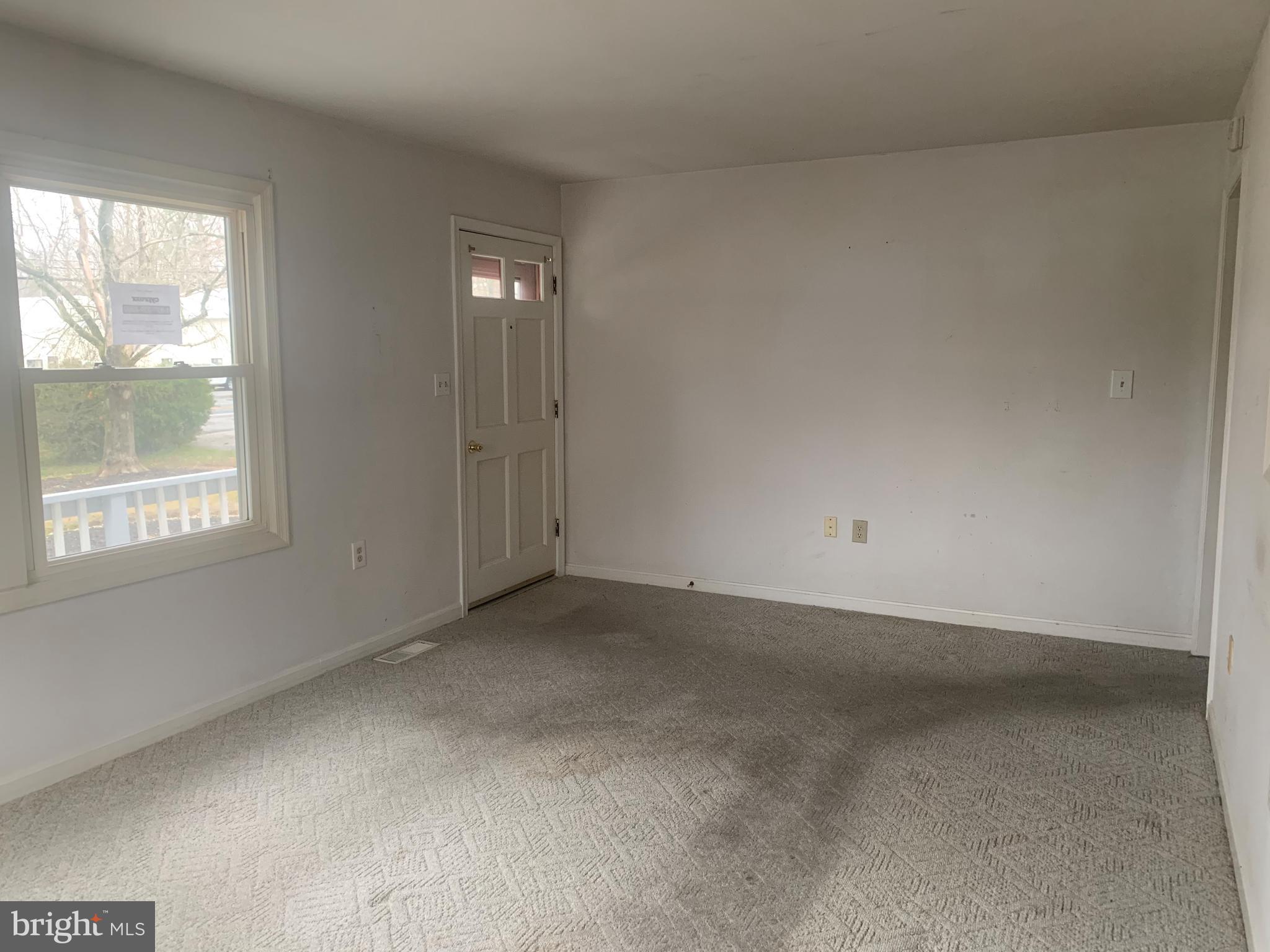 5866 Deale Churchton Road Deale, MD 20751 - Photo 4 of 26 an empty room with windows
