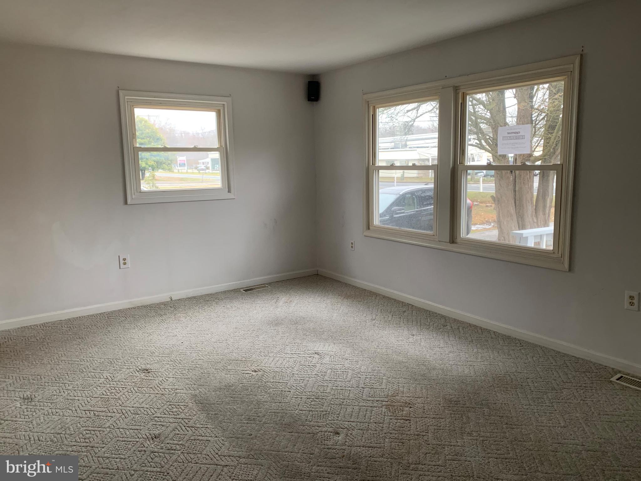 5866 Deale Churchton Road Deale, MD 20751 - Photo 6 of 26 an empty room with a window