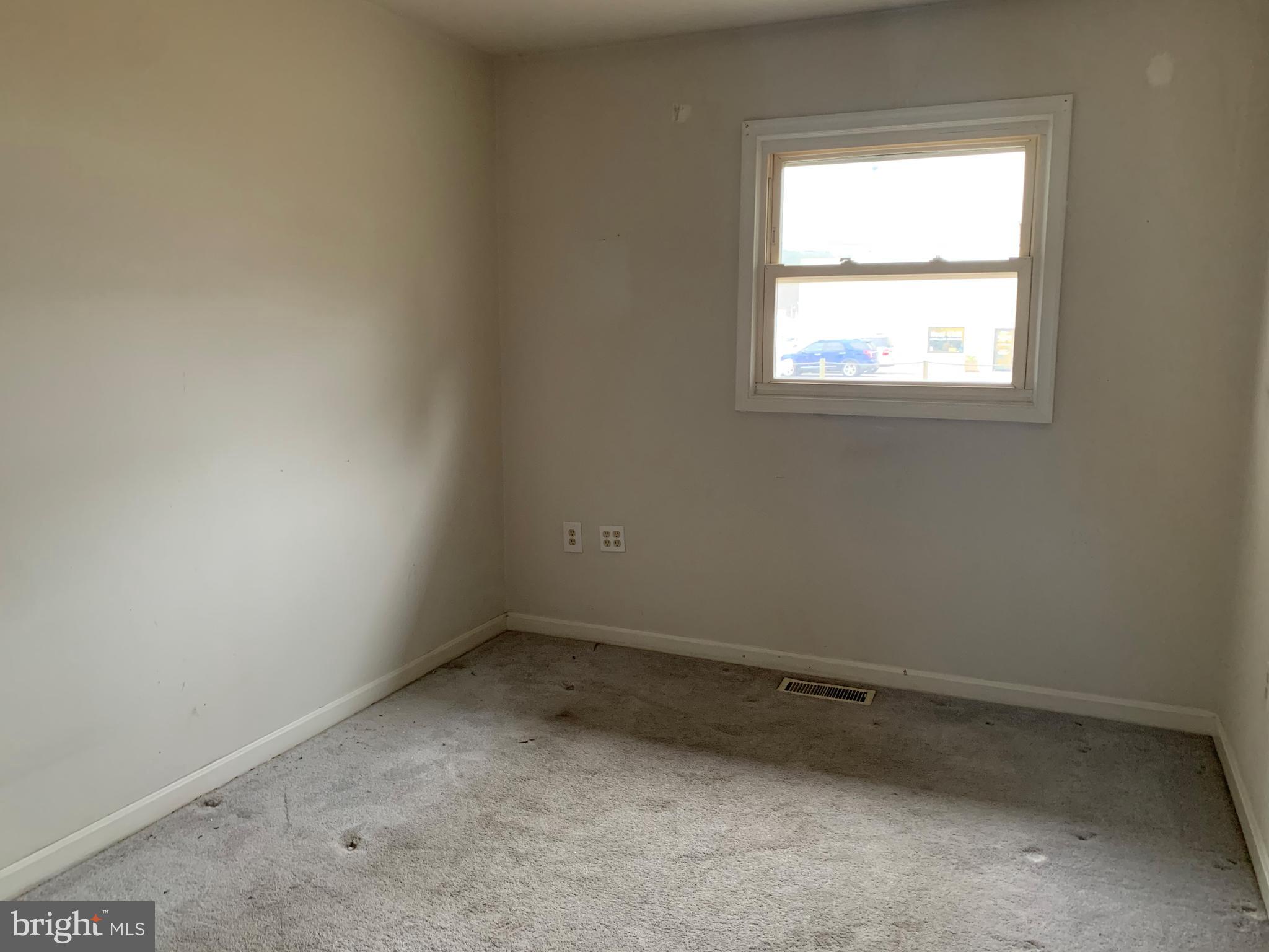 5866 Deale Churchton Road Deale, MD 20751 - Photo 9 of 26 an empty room with a window