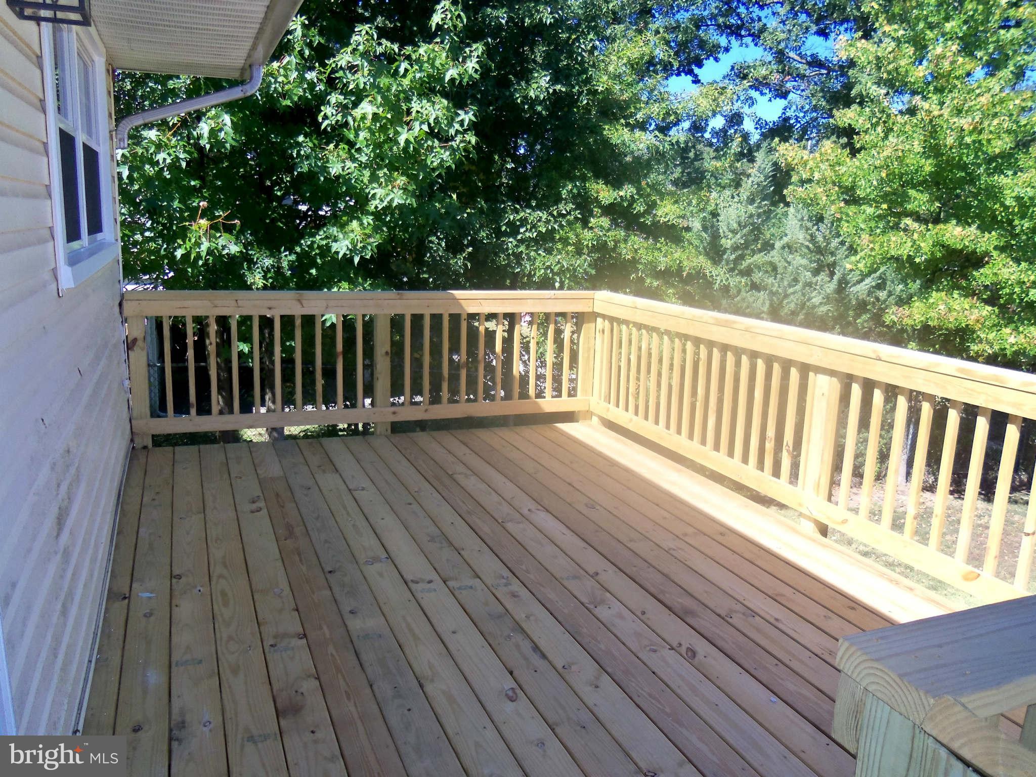 5704 Westgate Road Lanham, MD 20706 - Photo 24 of 25 a balcony with wooden floor