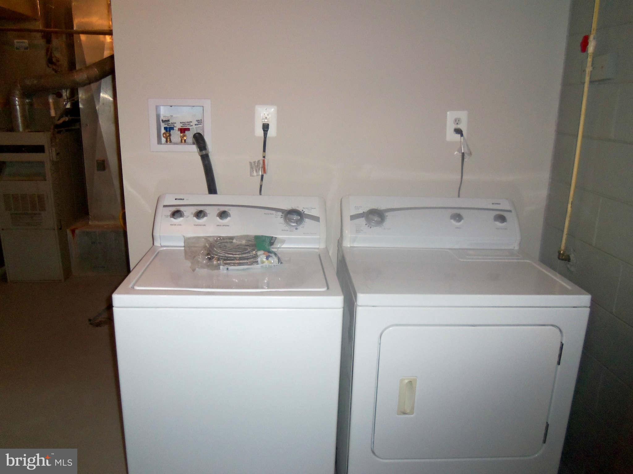 5704 Westgate Road Lanham, MD 20706 - Photo 25 of 25 a utility room with dryer and washer