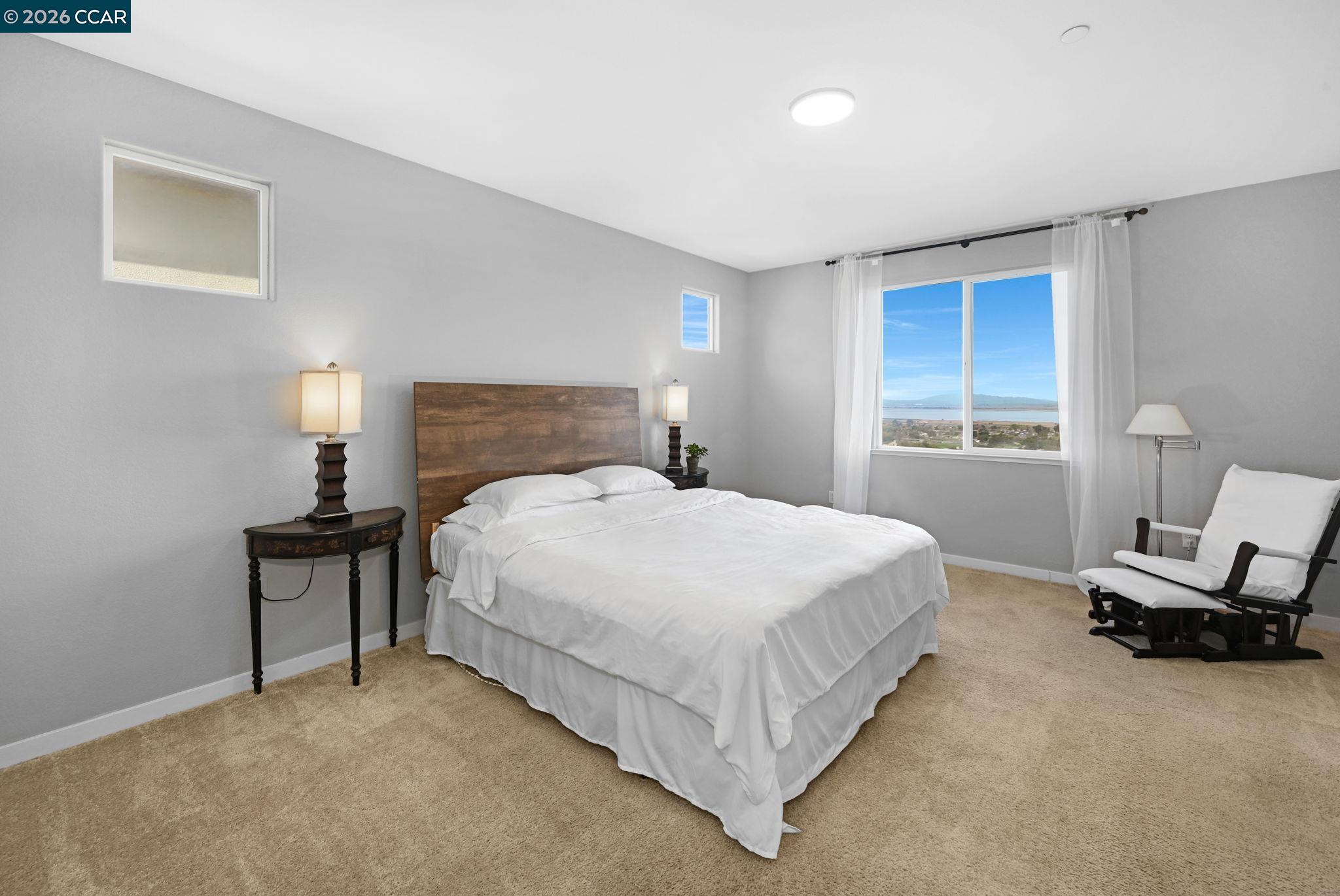 130 Savona Way Bay Point, CA 94565 - Photo 15 of 41 a bedroom with a bed and chair