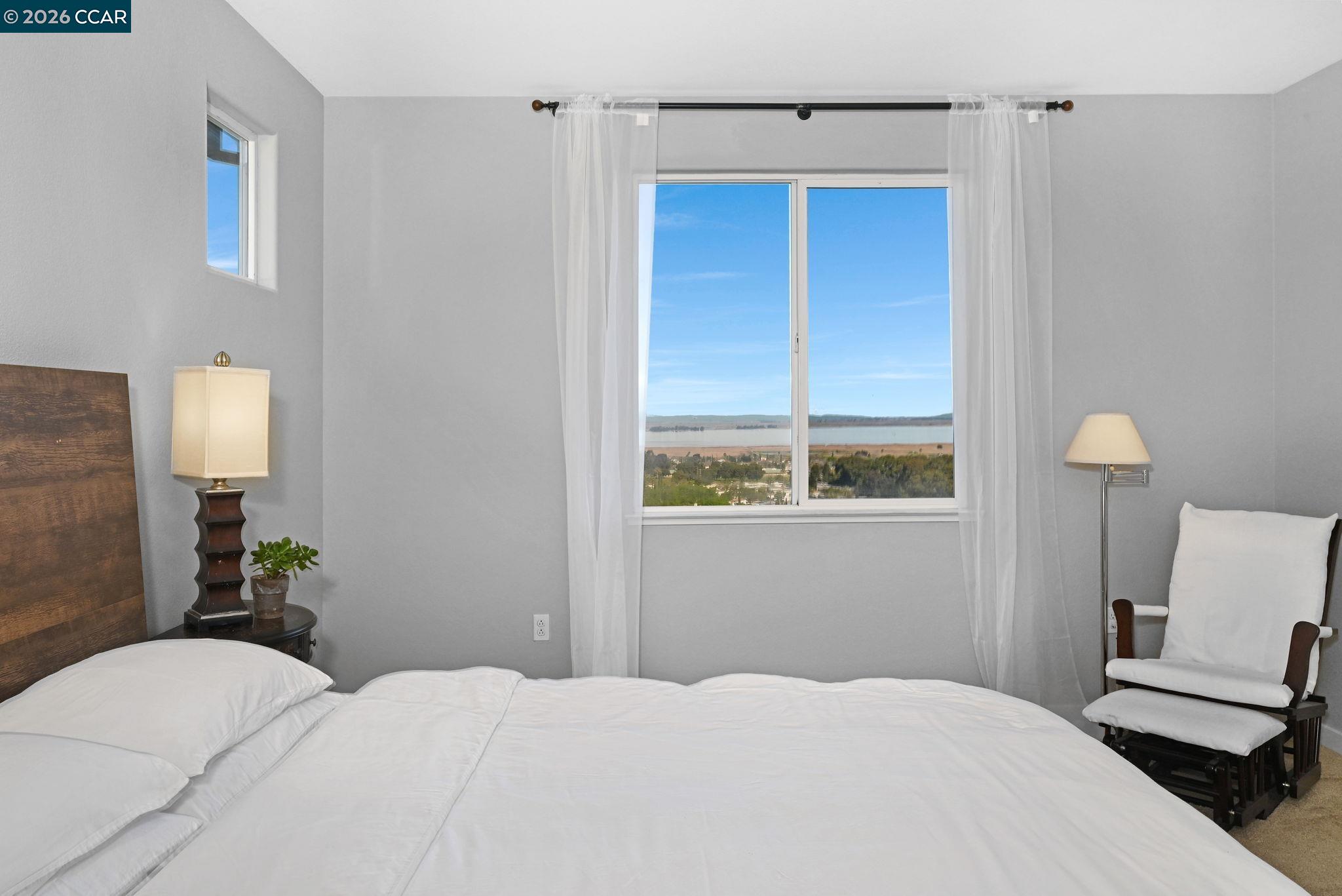 130 Savona Way Bay Point, CA 94565 - Photo 16 of 41 a bedroom with a bed and a window