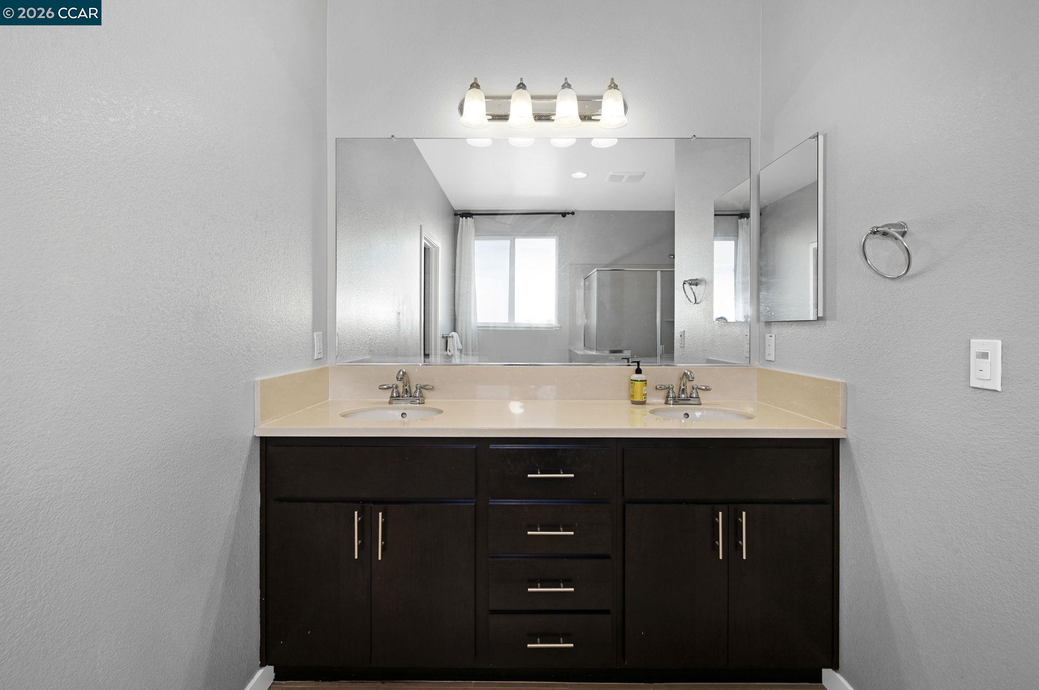 130 Savona Way Bay Point, CA 94565 - Photo 18 of 41 a bathroom with a sink and a mirror