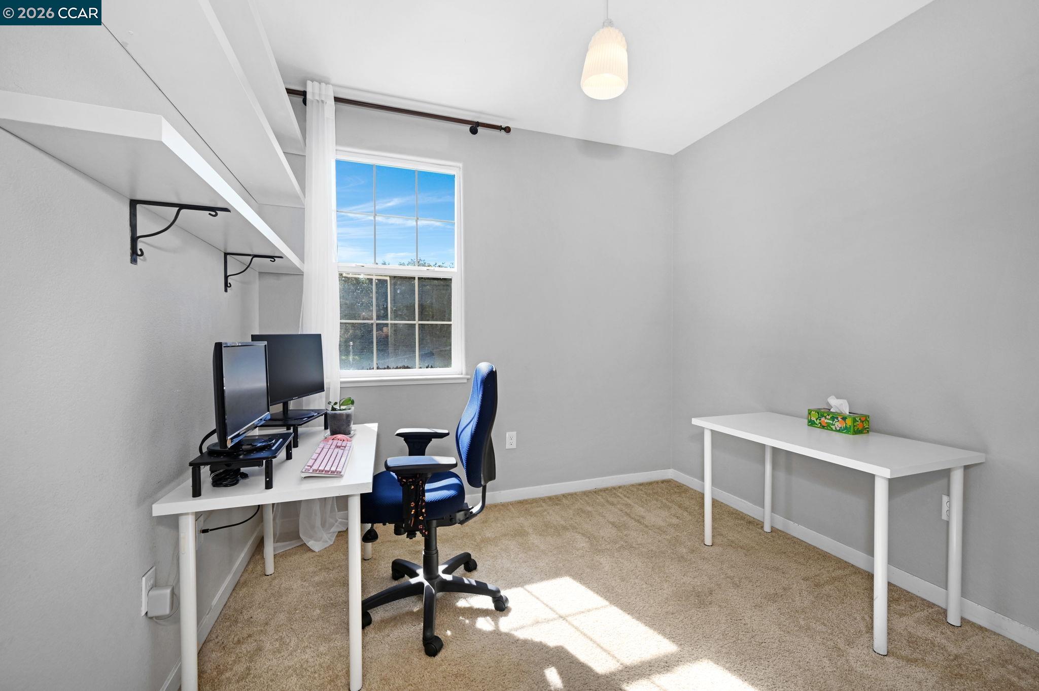 130 Savona Way Bay Point, CA 94565 - Photo 21 of 41 a view of a workspace with furniture and a window