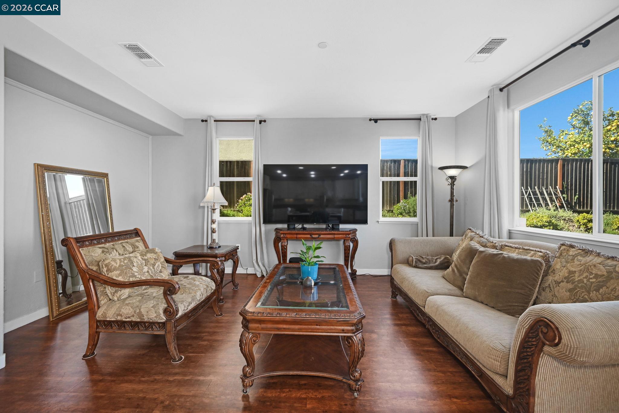 130 Savona Way Bay Point, CA 94565 - Photo 8 of 41 a living room with furniture and a flat screen tv