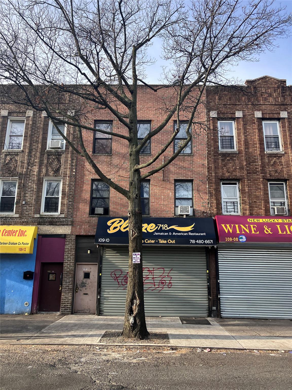 109-10 Guy R Brewer Boulevard Queens, NY 11433 - Photo 1 of 5 a house on the side of a street