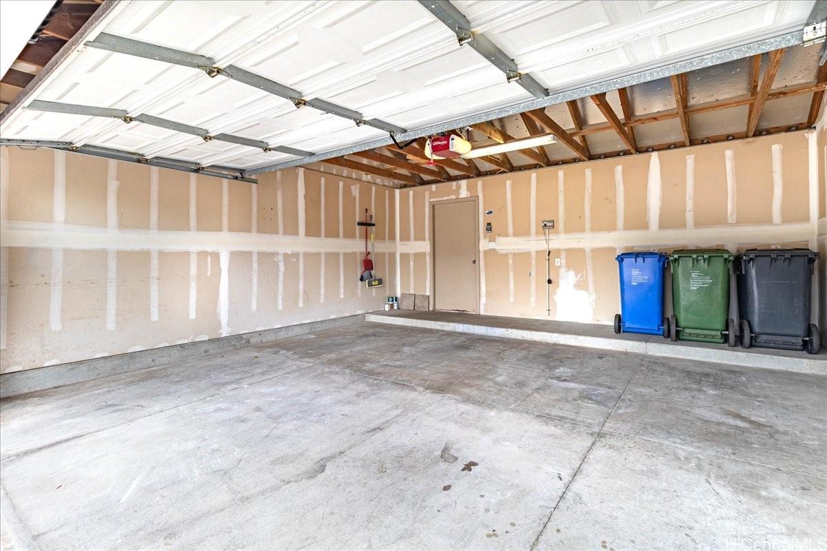 91-1121 Keoneula Boulevard, Unit L5 Ewa Beach, HI 96706 - Photo 18 of 20 a view of an entrance of the building