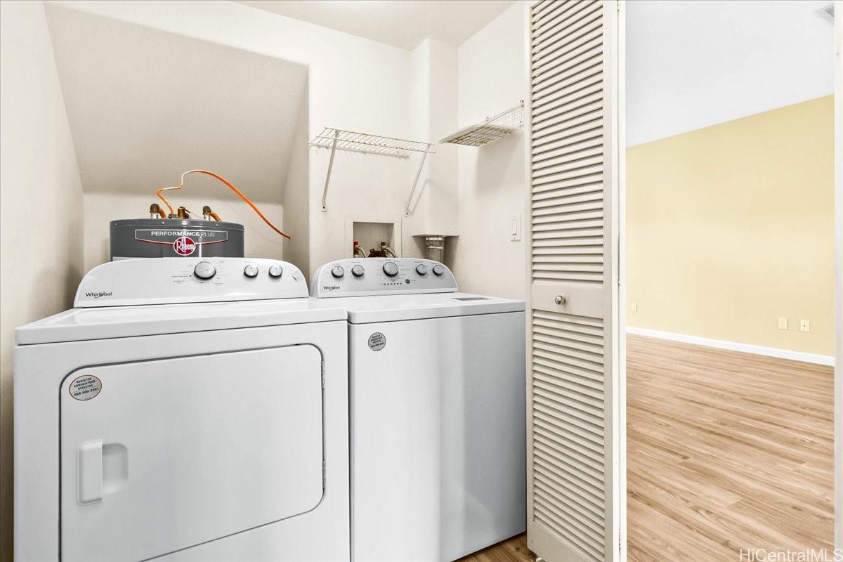 91-1121 Keoneula Boulevard, Unit L5 Ewa Beach, HI 96706 - Photo 8 of 20 a utility room with dryer and washer