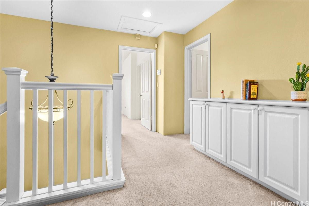 91-1121 Keoneula Boulevard, Unit L5 Ewa Beach, HI 96706 - Photo 10 of 20 a view of an entryway with a floor to ceiling window