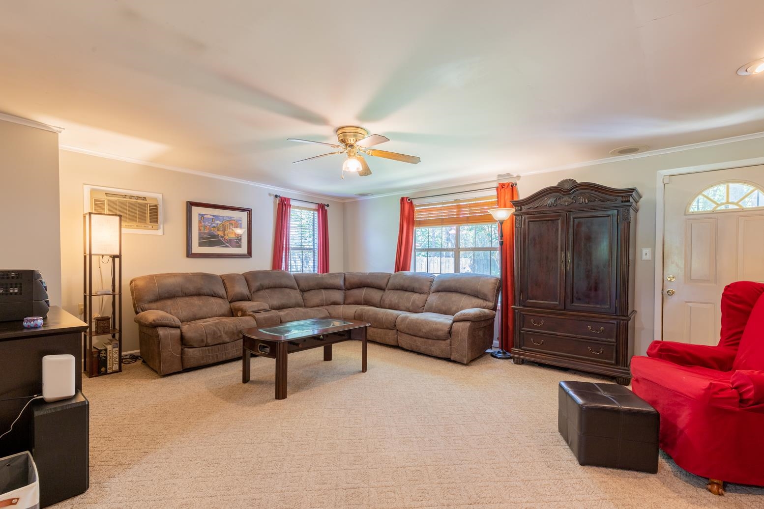 5098 Mason Road Memphis, TN 38117 - Photo 11 of 25 a living room with furniture a ceiling fan a rug and a window