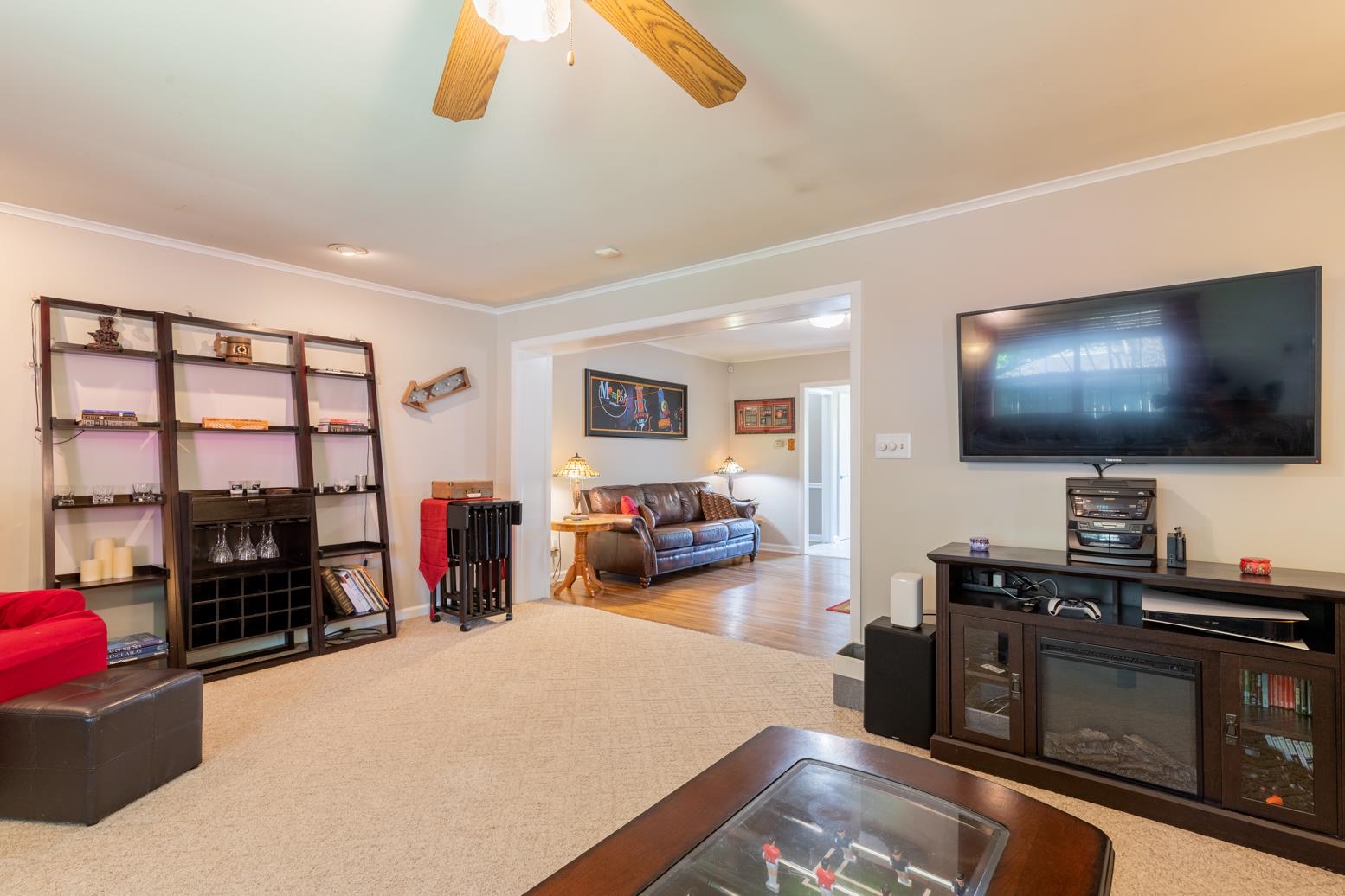 5098 Mason Road Memphis, TN 38117 - Photo 12 of 25 a living room with furniture and a flat screen tv