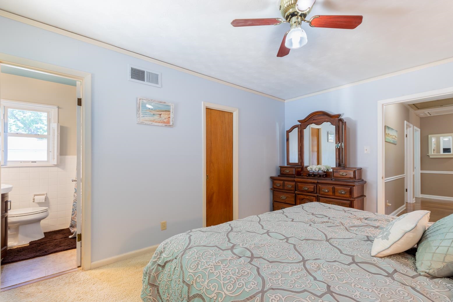 5098 Mason Road Memphis, TN 38117 - Photo 15 of 25 a bedroom with a bed and wooden floor