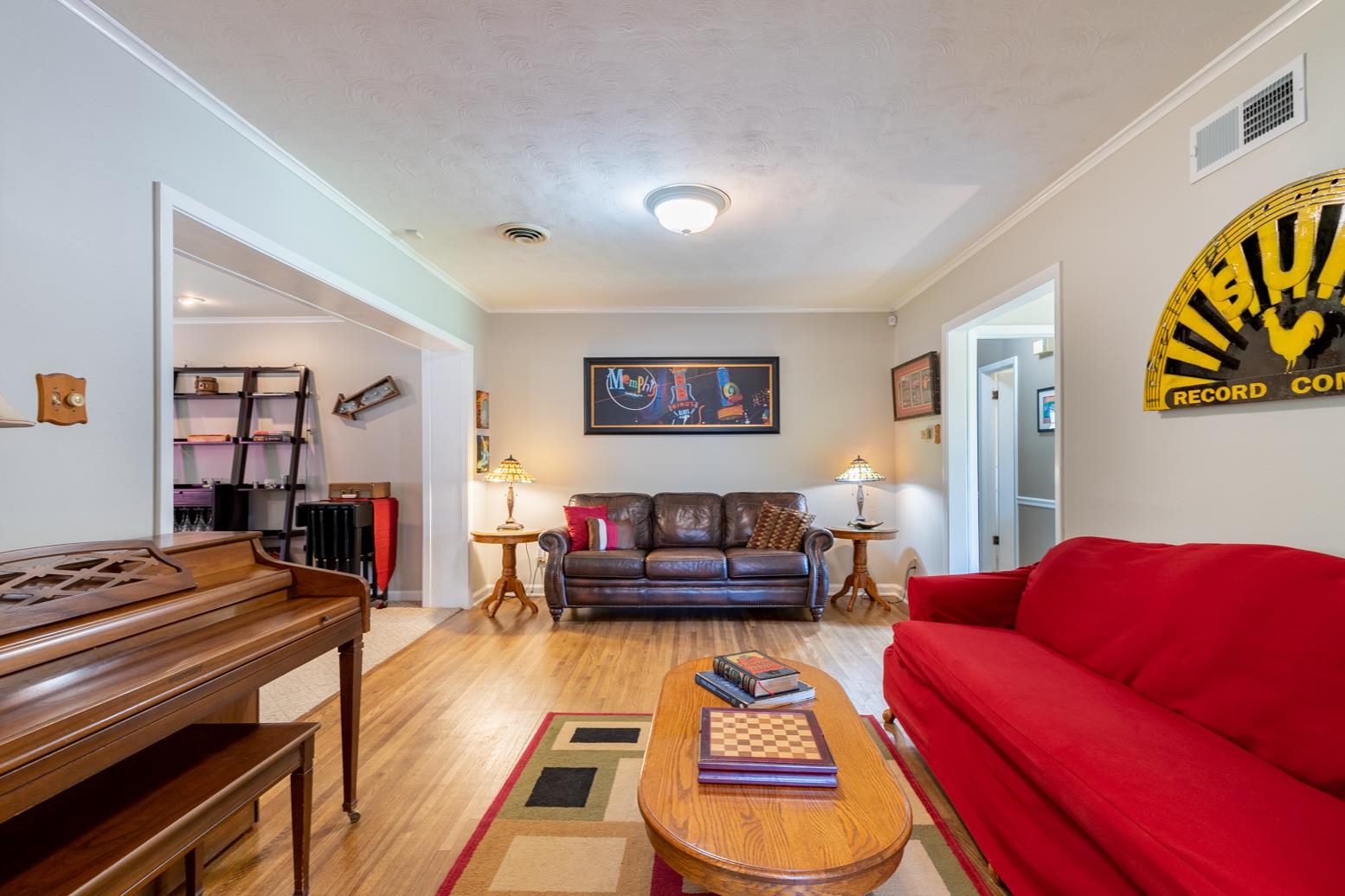 5098 Mason Road Memphis, TN 38117 - Photo 8 of 25 a living room with furniture and a bookshelf
