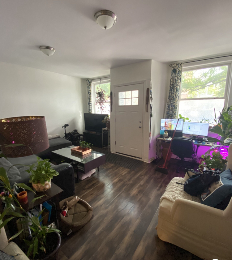 1014 West 19th Street, Unit 1F Chicago, IL 60608 - Photo 2 of 15 a living room with furniture and a window