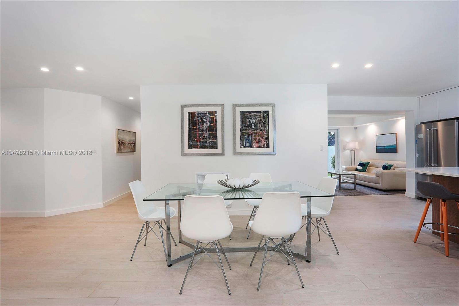 4033 South Le Jeune Road Miami, FL 33146 - Photo 3 of 19 a view of a dining room with furniture
