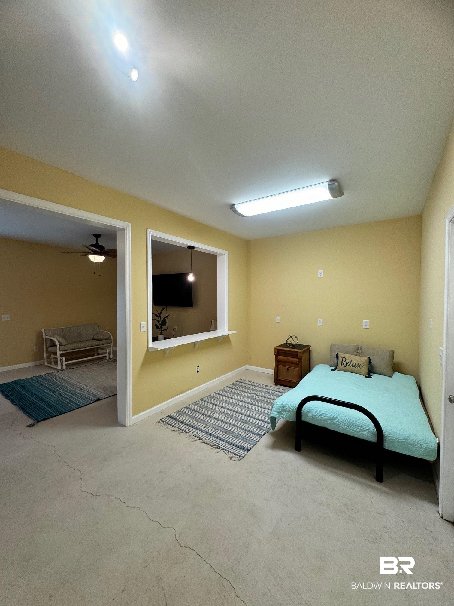 1985 Ridgewood Drive South Lillian, AL 36549 - Photo 17 of 40 Bedroom with carpet flooring