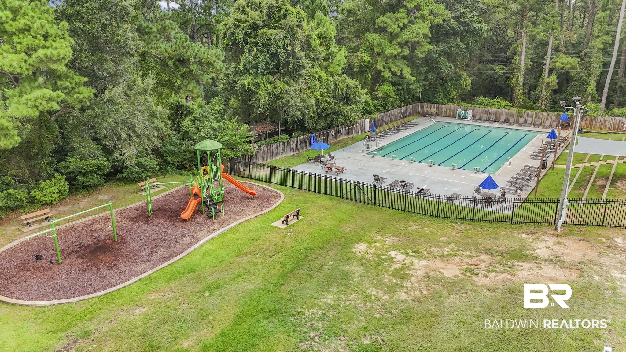 140 Hope Drive Daphne, AL 36526 - Photo 47 of 54 View of pool featuring a view of trees