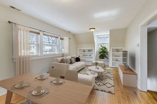 a kitchen with cabinets appliances and a sink