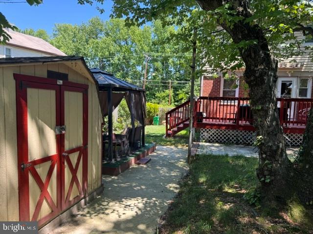 4603 Raleigh Road Temple Hills, MD 20748 - Photo 23 of 40 a view of a porch with a tree