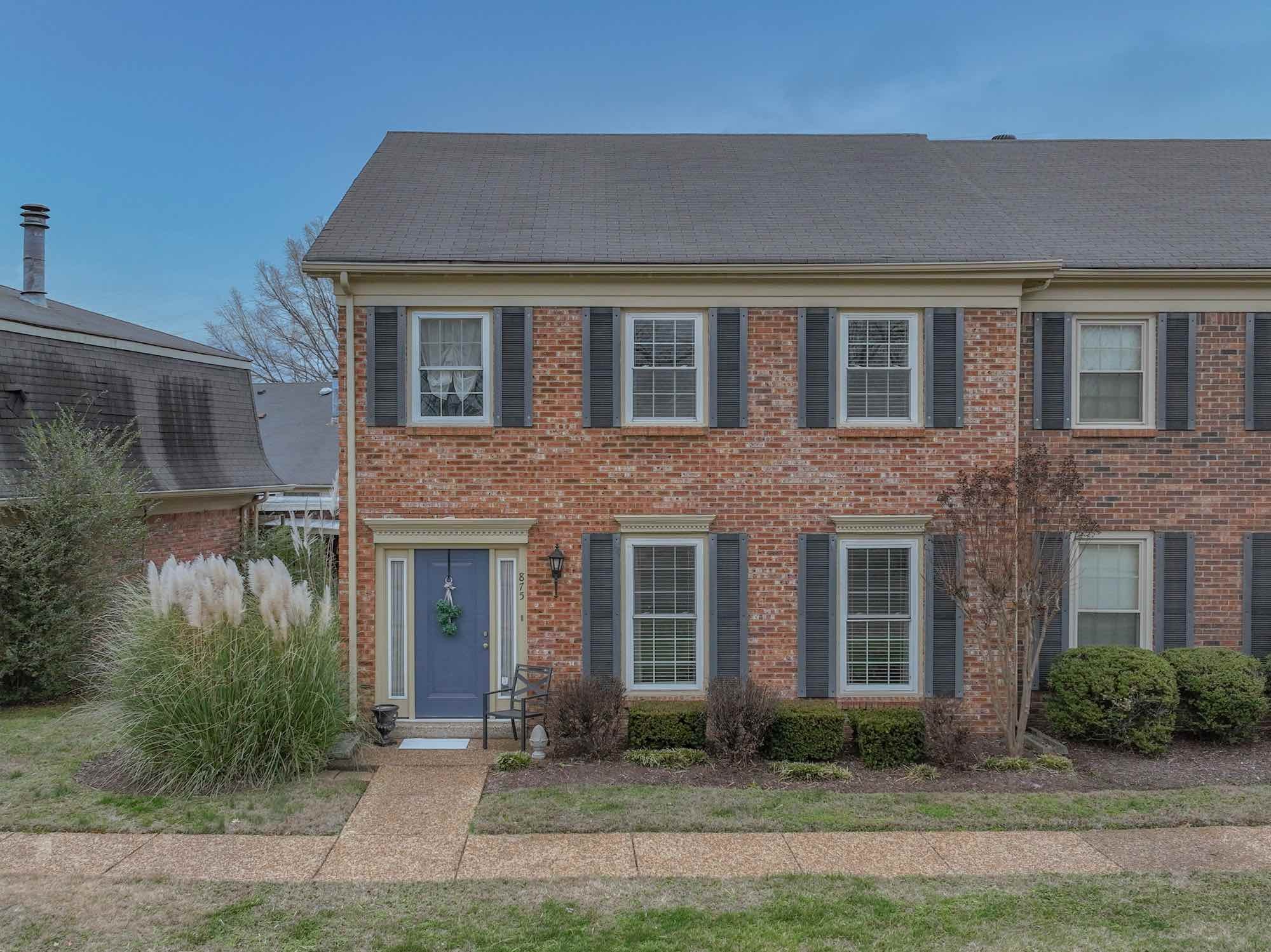 875 General George Patton Road Nashville, TN 37221 - Photo 2 of 42 a front view of a house with garden
