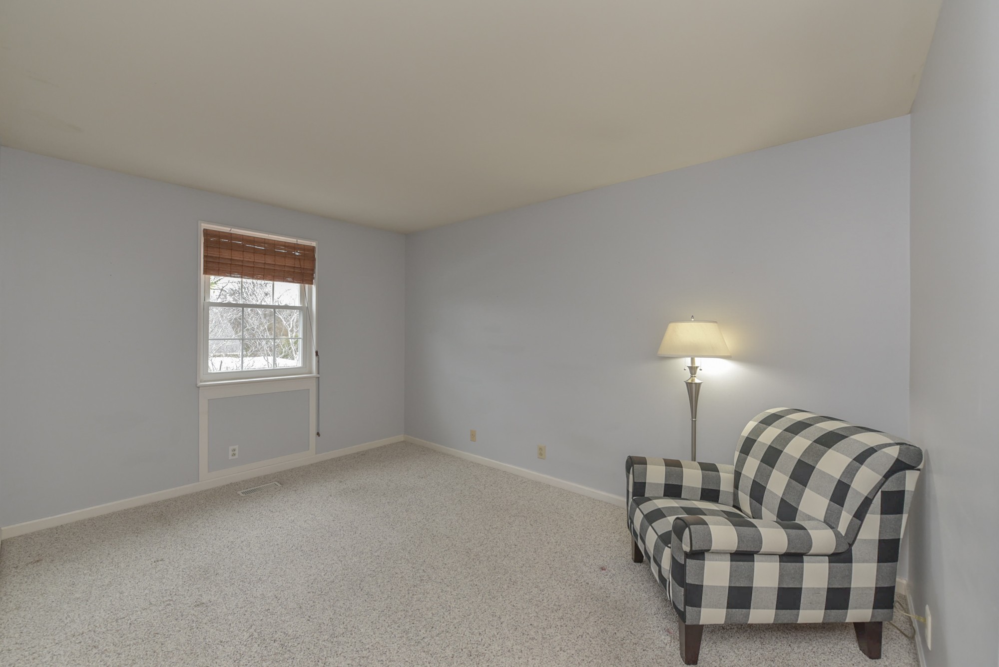 875 General George Patton Road Nashville, TN 37221 - Photo 28 of 42 a living room with furniture and a lamp
