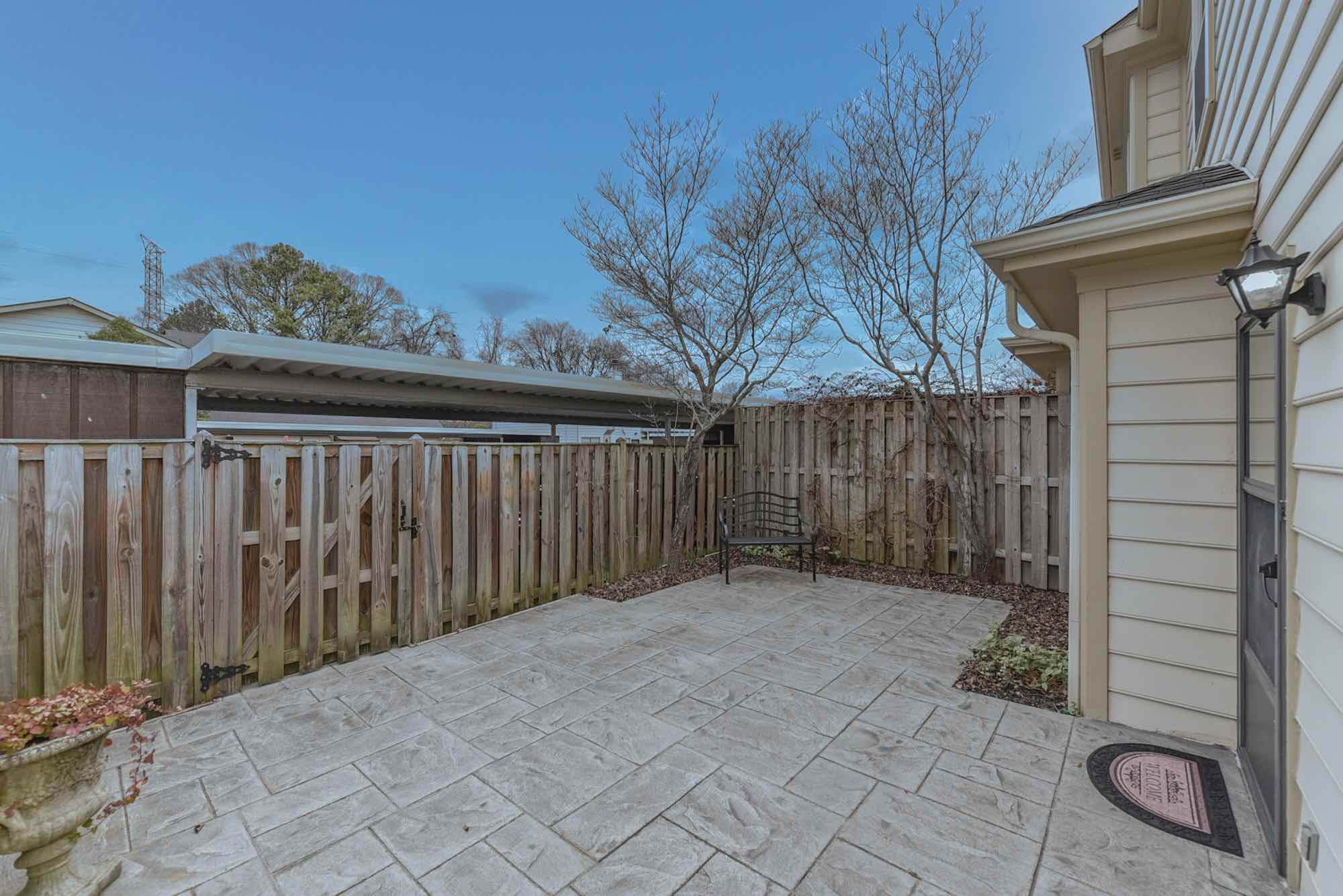 875 General George Patton Road Nashville, TN 37221 - Photo 32 of 42 a view of a pathway of a house with wooden fence