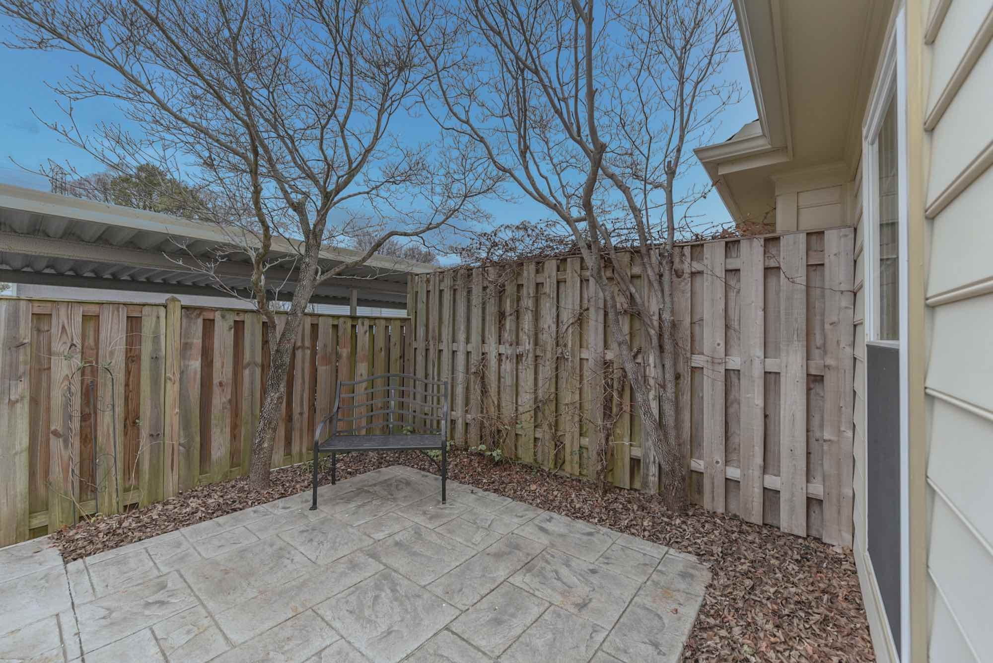 875 General George Patton Road Nashville, TN 37221 - Photo 33 of 42 a view of a backyard with wooden fence