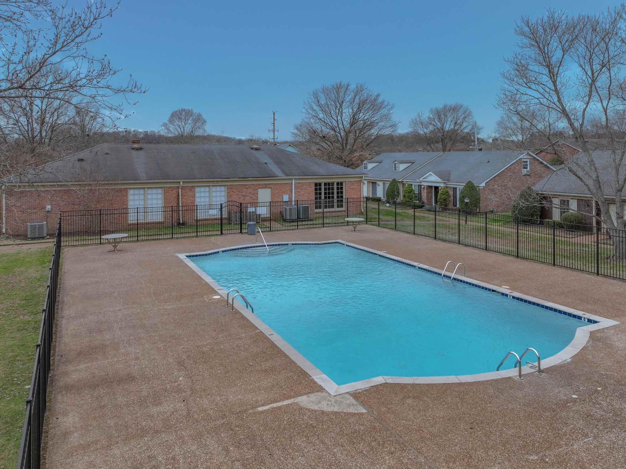 875 General George Patton Road Nashville, TN 37221 - Photo 40 of 42 a view of a house with a swimming pool and a yard