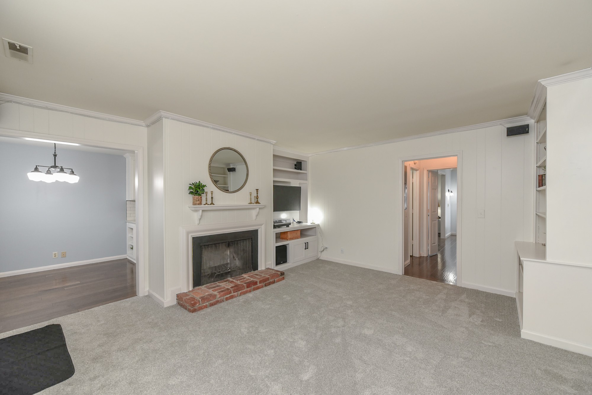 875 General George Patton Road Nashville, TN 37221 - Photo 8 of 42 a view of a livingroom with a fireplace and window