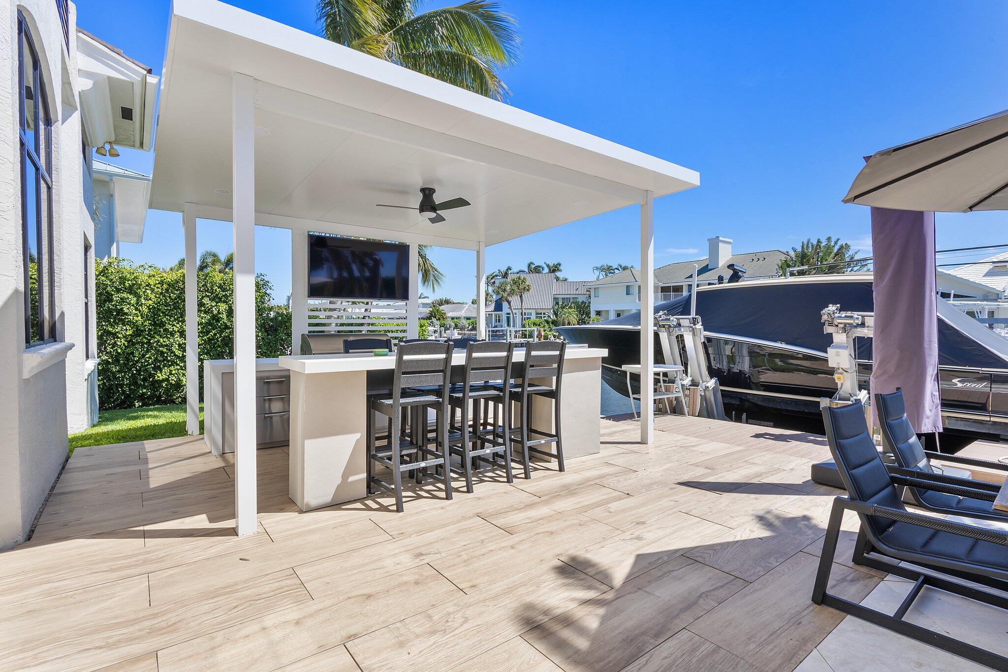 22 Eleuthera Drive Ocean Ridge, FL 33435 - Photo 69 of 92 Outdoor Kitchen and Dining