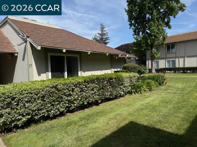 825 Oak Grove Road, Unit 17 Concord, CA 94518 - Photo 1 of 17 a view of a house with a yard