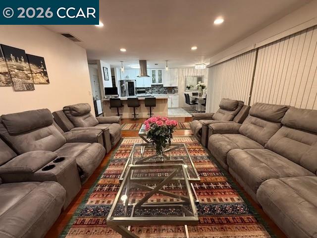 825 Oak Grove Road, Unit 17 Concord, CA 94518 - Photo 2 of 17 a living room with furniture or couch and a view of kitchen