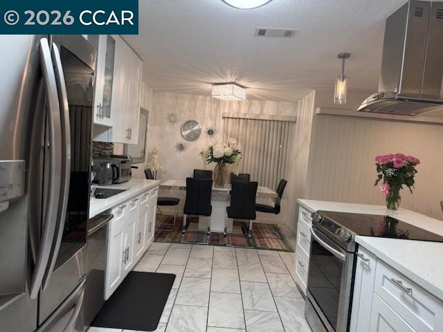 825 Oak Grove Road, Unit 17 Concord, CA 94518 - Photo 9 of 17 a kitchen with granite countertop a refrigerator and a sink