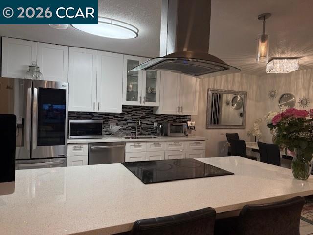 825 Oak Grove Road, Unit 17 Concord, CA 94518 - Photo 10 of 17 a kitchen with granite countertop a refrigerator a stove a sink a counter space and cabinets