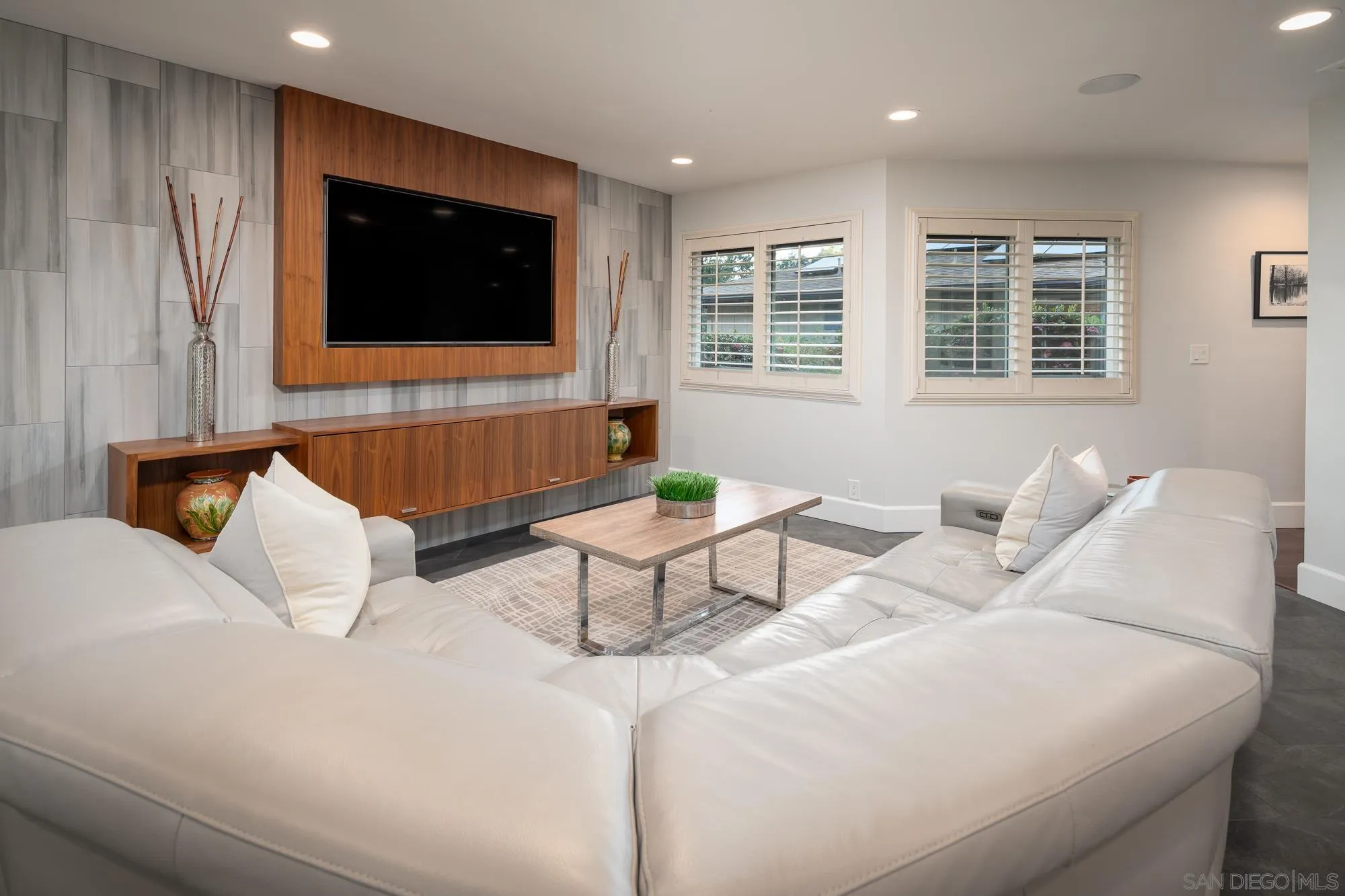 13384 Fallen Leaf Road Poway, CA 92064 - Photo 11 of 27 a living room with furniture and a flat screen tv
