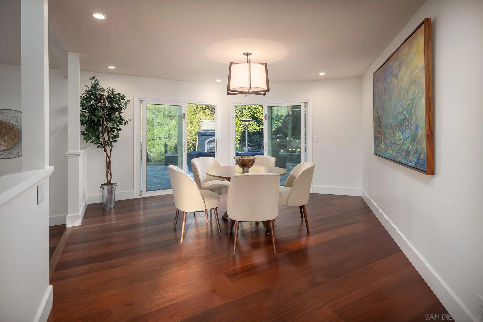 13384 Fallen Leaf Road Poway, CA 92064 - Photo 12 of 27 a view of a dining room with furniture window and wooden floor