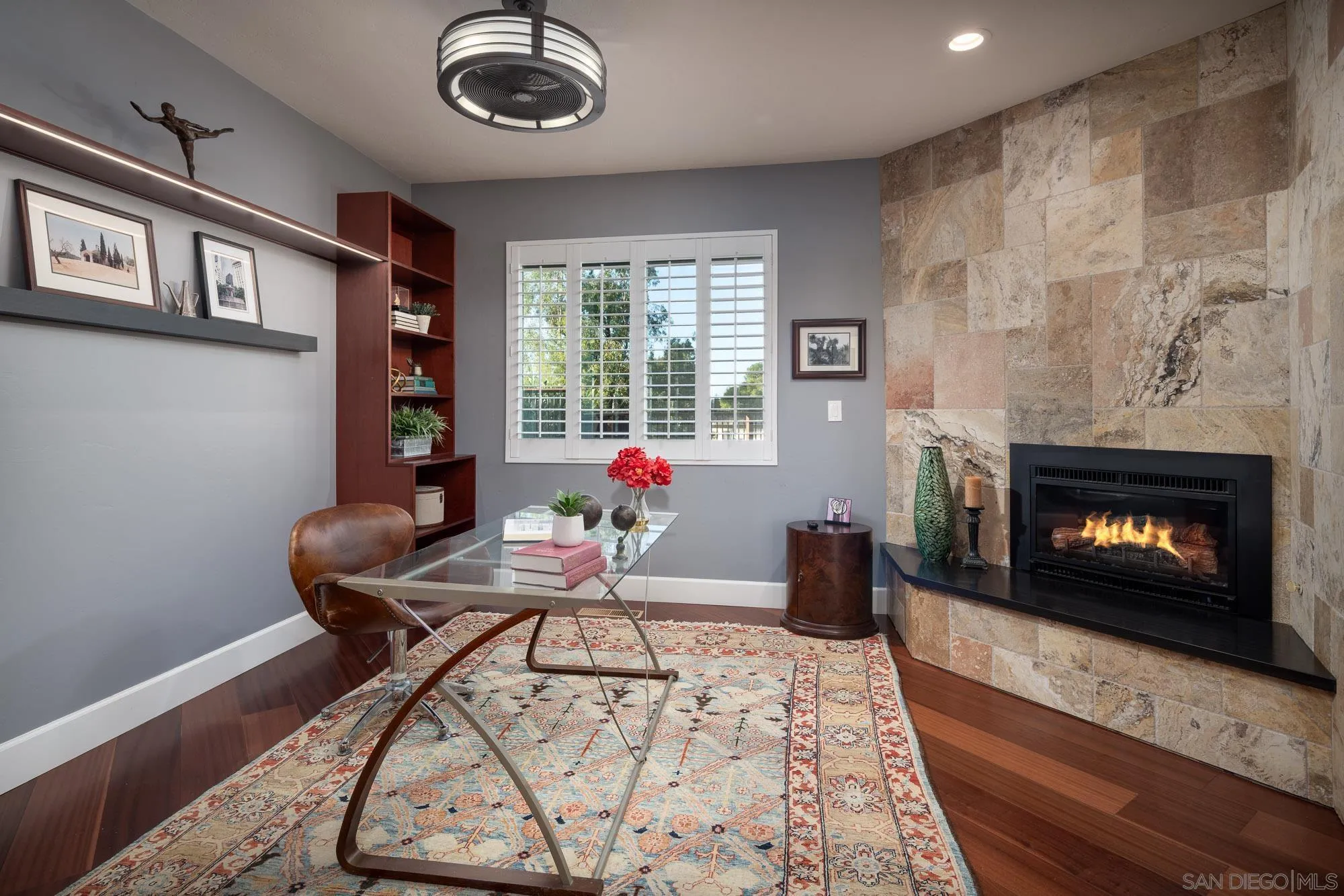 13384 Fallen Leaf Road Poway, CA 92064 - Photo 13 of 27 a living room with furniture and a fireplace