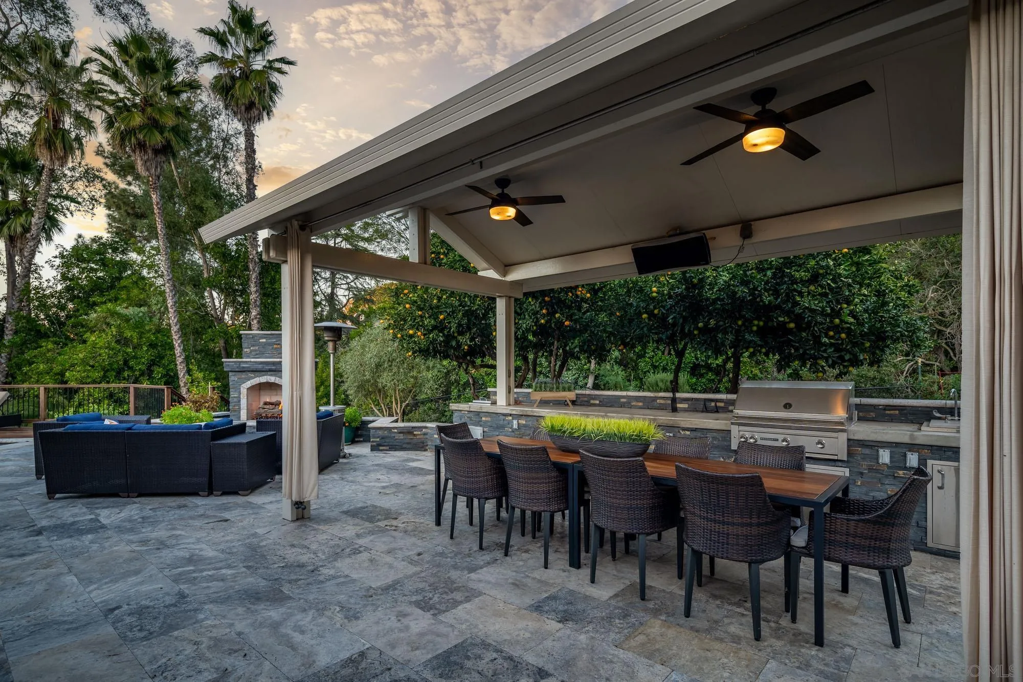 13384 Fallen Leaf Road Poway, CA 92064 - Photo 2 of 27 a view of a dining table and chairs in the patio