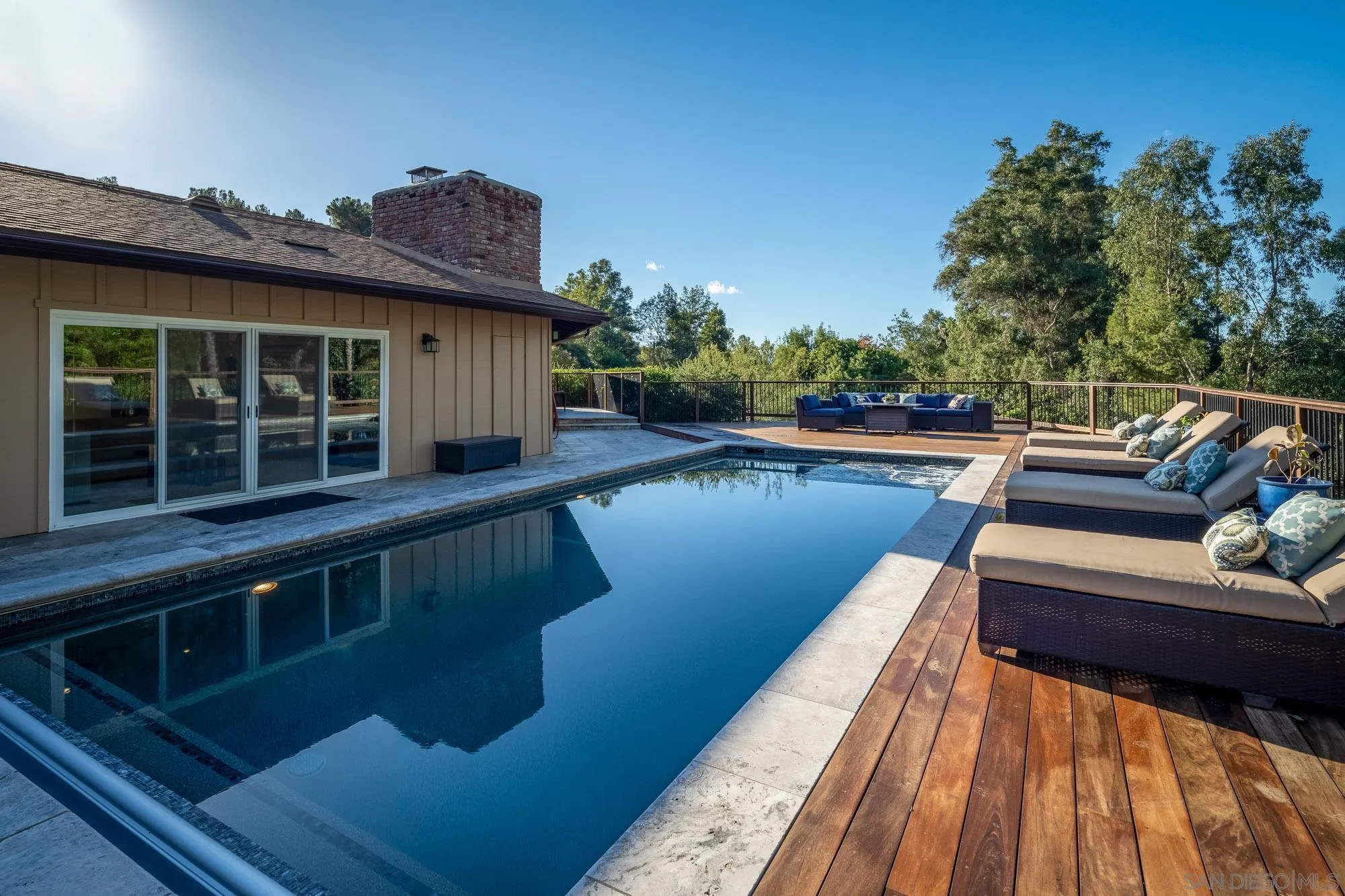 13384 Fallen Leaf Road Poway, CA 92064 - Photo 3 of 27 a view of a house with pool and wooden floor