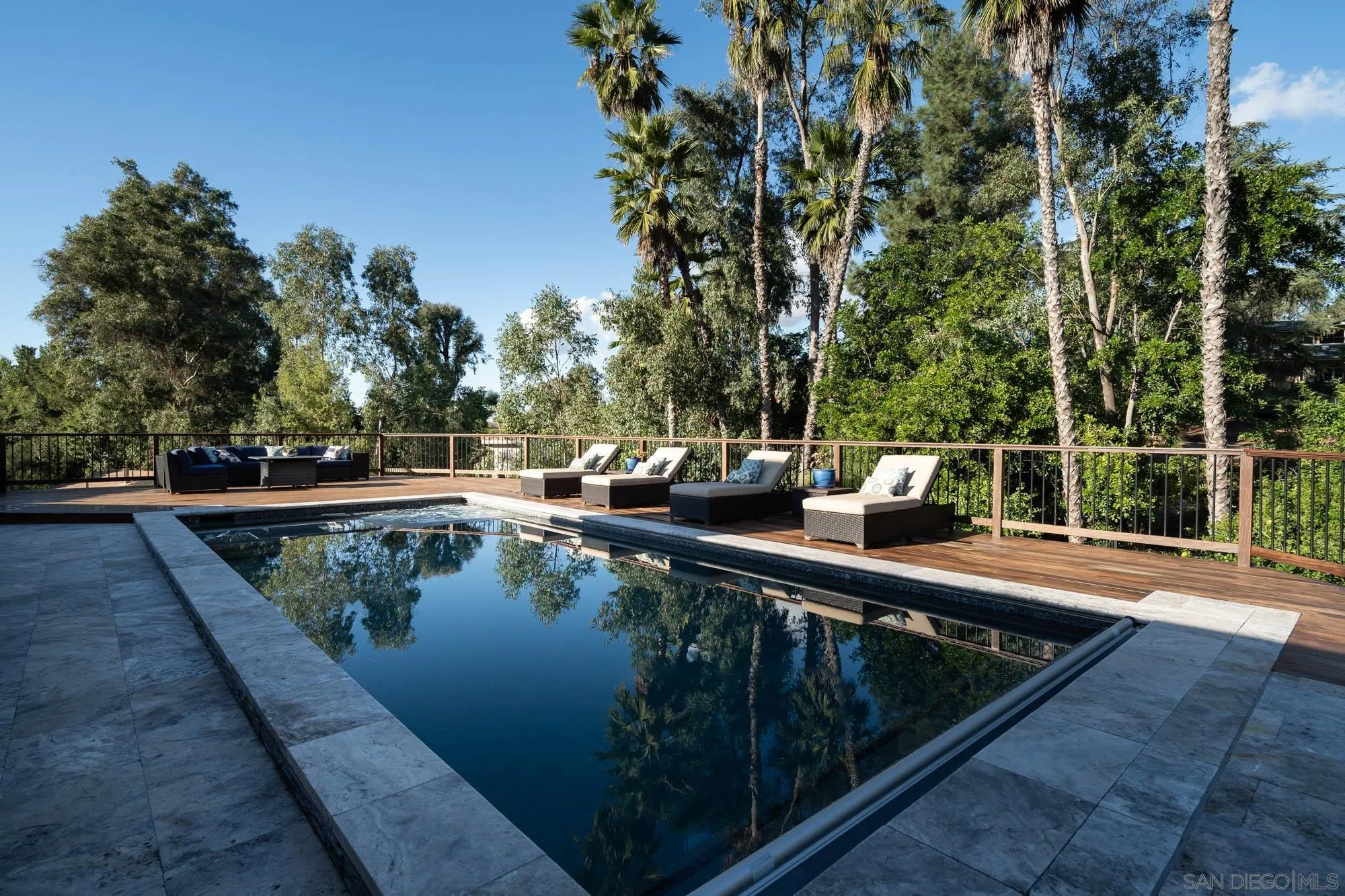 13384 Fallen Leaf Road Poway, CA 92064 - Photo 4 of 27 a view of swimming pool with chairs and trees